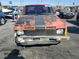 1987 Nissan Hardbody E z VIN JN6ND11S3HW006235, wystawiony jako Copart lot #78528914 z przebiegiem 298 079 mil mil oraz Szkody całkowita. Historia ofert i sprzedaży dostępna na DreamBid. Obrazek 5.