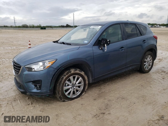 2016 Mazda CX-5 Touring with VIN JM3KE2CY4G0882671, listed as a Copart auction lot 51089555 with 50,951 mi miles and Salvage Title. Bid and sale history available at carsss.com. Image 1.