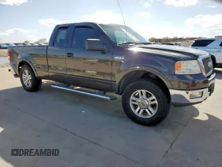 2005 Ford F-150 XLT with VIN 1FTPX12575NB60735, listed as a Copart auction lot 49598075 with 153,360 mi miles and Salvage title. Bid and sale history available at DreamBid. Image 4.