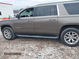 2015 GMC Yukon XL SLT with VIN 1GKS2HKC6FR582574, listed as a IAAI auction lot 41187550 with 185,737 mi miles. Bid and sale history available at carsss.com. Image 15.