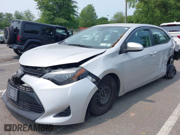 2018 Toyota Corolla L z VIN 2T1BURHE9JC067155, wystawiony jako IAAI lot #42492008 z przebiegiem 169 311 mil mil oraz . Historia ofert i sprzedaży dostępna na DreamBid. Obrazek 17.