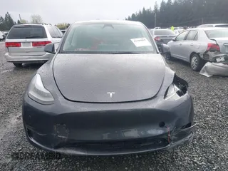 2023 Tesla Model Y Long Range with VIN 7SAYGAEE4PF871281, listed as a IAAI auction lot 41989805 with 15,501 mi miles. Bid and sale history available at carsss.com. Image 13.