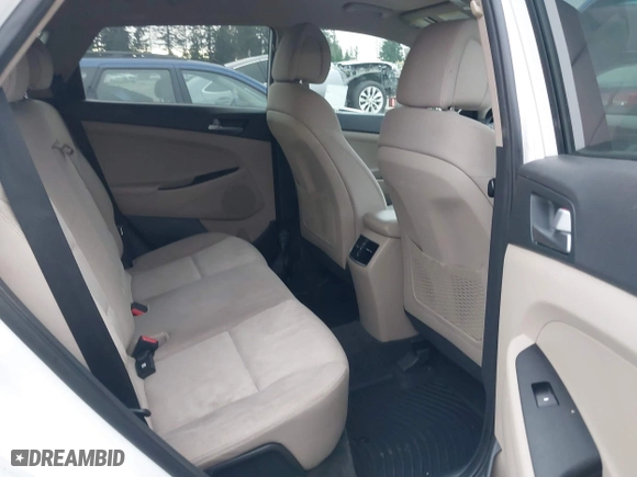 2017 Hyundai Tucson Value with VIN KM8J33A28HU301869, listed as a IAAI auction lot 41288511 with 111,143 mi miles. Bid and sale history available at carsss.com. Image 8.