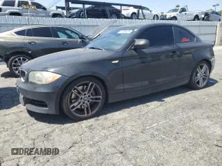 2011 BMW 1 Series 135i with VIN WBAUC9C59BVM10528, listed as a Copart auction lot 61499025 with 160,557 mi miles and Salvage title. Bid and sale history available at DreamBid. Image 1.