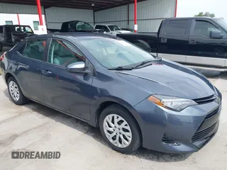 2018 Toyota Corolla L with VIN 5YFBURHE8JP770696, listed as a IAAI auction lot 42386025 with 63,224 mi miles and . Bid and sale history available at DreamBid. Image 1.