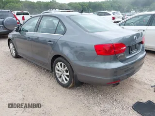 2014 Volkswagen Jetta SE with VIN 3VWD07AJ2EM209176, listed as a IAAI auction lot 42460383 with 172,550 mi miles and . Bid and sale history available at DreamBid. Image 3.