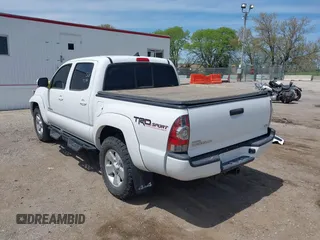 2015 Toyota Tacoma with VIN 3TMLU4EN2FM193142, listed as a IAAI auction lot 42189553 with 70,480 mi miles and . Bid and sale history available at DreamBid. Image 3.