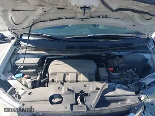 2016 Honda Odyssey EX-L with VIN 5FNRL5H65GB055916, listed as a IAAI auction lot 41980339 with 87,497 mi miles. Bid and sale history available at carsss.com. Image 10.