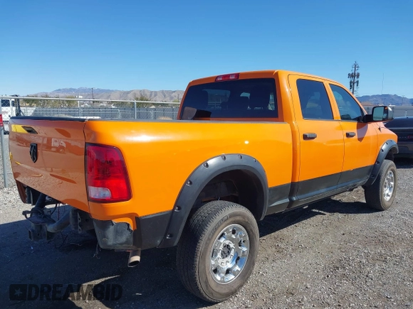 2014 Ram 2500 Tradesman z VIN 3C6TR5CTXEG235098, wystawiony jako IAAI lot #41831596 z przebiegiem 97 540 mil mil oraz . Historia ofert i sprzedaży dostępna na DreamBid. Obrazek 4.
