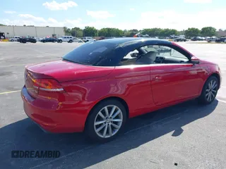 2013 Volkswagen Eos Komfort with VIN WVWBW8AH9DV008763, listed as a IAAI auction lot 41893700 with 53,766 mi miles and . Bid and sale history available at DreamBid. Image 4.