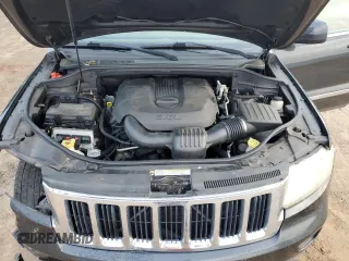 2011 Jeep Grand Cherokee Laredo z VIN 1J4RR4GG0BC518726, wystawiony jako Copart lot #58985765 z przebiegiem 163 625 mil mil oraz Szkoda całkowita • Salvage title. Historia ofert i sprzedaży dostępna na DreamBid. Obrazek 12.