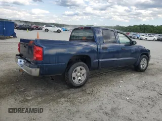 2005 Dodge Dakota SLT with VIN 1D7HE48NX5S308595, listed as a Copart auction lot 56713434 with 257,419 mi miles and Salvage Title. Bid and sale history available at carsss.com. Image 3.