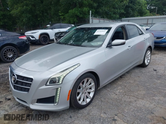 2014 Cadillac CTS Luxury RWD z VIN 1G6AR5S38E0173628, wystawiony jako IAAI lot #42343647 z przebiegiem 166 035 mil mil oraz . Historia ofert i sprzedaży dostępna na DreamBid. Obrazek 2.