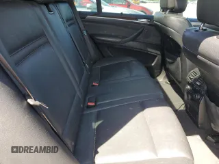 2012 BMW X5 35d z VIN 5UXZW0C59CL670242, wystawiony jako Copart lot #57638165 z przebiegiem 174 430 mil mil oraz Szkoda całkowita • Salvage title. Historia ofert i sprzedaży dostępna na DreamBid. Obrazek 11.