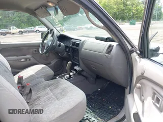 2001 Toyota Tacoma z VIN 5TENL42N31Z873658, wystawiony jako IAAI lot #42476133 z przebiegiem 261 394 mil mil oraz . Historia ofert i sprzedaży dostępna na DreamBid. Obrazek 5.