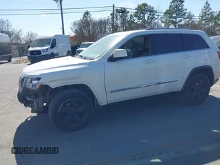 2012 Jeep Grand Cherokee Laredo with VIN 1C4RJFAT4CC229204, listed as a IAAI auction lot 41659491 with 141,143 mi miles. Bid and sale history available at carsss.com. Image 17.