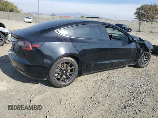 2023 Tesla Model 3 with VIN 5YJ3E1EA6PF503789, listed as a Copart auction lot 88225605 with 55,885 mi miles and Salvage Title. Bid and sale history available at carsss.com. Image 3.