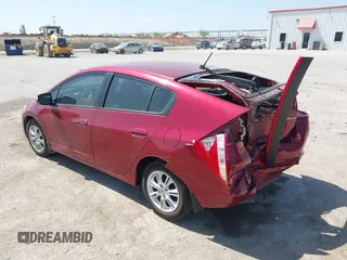 2010 Honda Insight EX with VIN JHMZE2H73AS009253, listed as a IAAI auction lot 41882569 with 104,839 mi miles and . Bid and sale history available at DreamBid. Image 3.