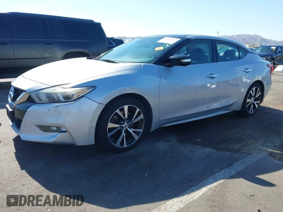2016 Nissan Maxima SL z VIN 1N4AA6AP3GC377081, wystawiony jako IAAI lot #42235817 z przebiegiem 159 571 mil mil oraz . Historia ofert i sprzedaży dostępna na DreamBid. Obrazek 2.