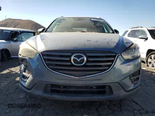 2016 Mazda CX-5 Grand Touring with VIN JM3KE2DY8G0644790, listed as a Copart auction lot 82060424 with 0 mi miles and Clean Title. Bid and sale history available at carsss.com. Image 5.