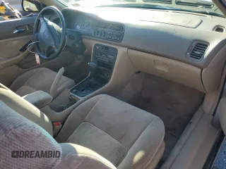 1997 Honda Accord LX with VIN 1HGCD723XVA033754, listed as a Copart auction lot 85194774 with 77,269 mi miles and Salvage Title. Bid and sale history available at carsss.com. Image 8.
