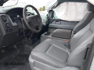 2014 Ford F-150 XL with VIN 1FTEX1EM2EFB00107, listed as a IAAI auction lot 40443721 with 121,674 mi miles and . Bid and sale history available at carsss.com. Image 5.
