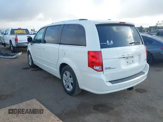 2013 Dodge Grand Caravan Crew with VIN 2C4RDGDG4DR606263, listed as a IAAI auction lot 41898351 with 127,044 mi miles and . Bid and sale history available at DreamBid. Image 3.