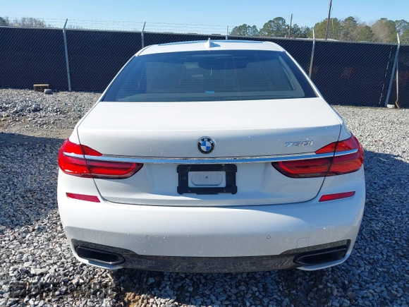 2017 BMW 7 Series 750i with VIN WBA7F0C34HGM21738, listed as a IAAI auction lot 41772933 with 62,923 mi miles and . Bid and sale history available at DreamBid. Image 16.