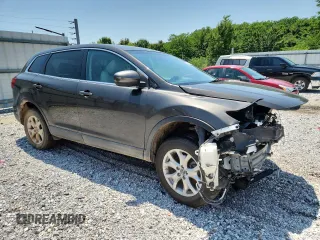 2015 Mazda CX-9 Sport с VIN JM3TB2BA5F0459548, выставлен на аукционе Copart как лот 60217845 с пробегом 152 486 миль миль и Чистый • Clean title. История ставок и продаж доступна на DreamBid. Изображение 4.