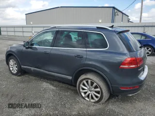 2012 Volkswagen Touareg Sport with VIN WVGEK9BP7CD006059, listed as a Copart auction lot 49411245 with 202,323 mi miles and Clean Title. Bid and sale history available at DreamBid. Image 2.