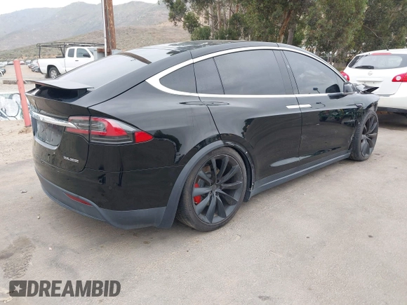 2020 Tesla Model X P90D with VIN 5YJXCDE4XLF296255, listed as a IAAI auction lot 42087953 with 45,411 mi miles. Bid and sale history available at carsss.com. Image 4.