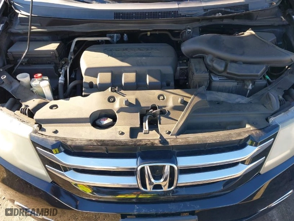 2014 Honda Odyssey Touring with VIN 5FNRL5H9XEB076185, listed as a IAAI auction lot 41512973 with 113,448 mi miles. Bid and sale history available at carsss.com. Image 10.