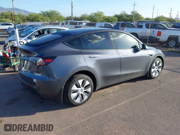 2023 Tesla Model Y Long Range with VIN 7SAYGDEE0PF928836, listed as a IAAI auction lot 41538742 with 9,630 mi miles and . Bid and sale history available at DreamBid. Image 4.