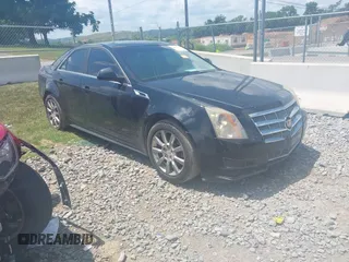 2011 Cadillac CTS Luxury with VIN 1G6DG5EYXB0121357, listed as a IAAI auction lot 42629349 with 168,816 mi miles and . Bid and sale history available at DreamBid. Image 1.