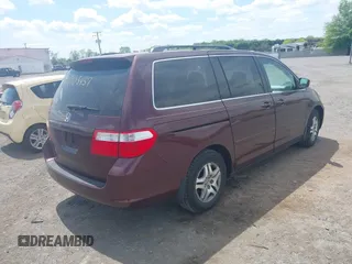 2007 Honda Odyssey EX-L with VIN 5FNRL387X7B421270, listed as a IAAI auction lot 42103457 with 250,980 mi miles. Bid and sale history available at carsss.com. Image 4.