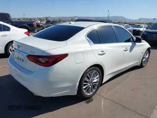 2019 Infiniti Q50 3.0t LUXE with VIN JN1EV7AP5KM514713, listed as a IAAI auction lot 41528021 with 90,306 mi miles. Bid and sale history available at carsss.com. Image 4.
