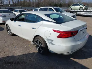 2017 Nissan Maxima Platinum with VIN 1N4AA6AP9HC444350, listed as a IAAI auction lot 41761566 with 90,604 mi miles and . Bid and sale history available at DreamBid. Image 3.