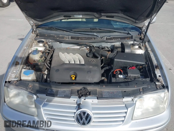 1999 Volkswagen Jetta z VIN 3VWSC29M9XM067508, wystawiony jako IAAI lot #41905002 z przebiegiem 32 051 mil mil oraz . Historia ofert i sprzedaży dostępna na DreamBid. Obrazek 10.