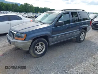2002 Jeep Grand Cherokee Laredo with VIN 1J4GW48S92C150162, listed as a IAAI auction lot 42471732 with 171,677 mi miles and . Bid and sale history available at DreamBid. Image 2.