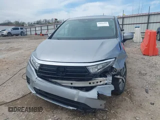 2021 Honda Odyssey Touring with VIN 5FNRL6H8XMB034837, listed as a IAAI auction lot 41856444 with 84,950 mi miles. Bid and sale history available at carsss.com. Image 12.