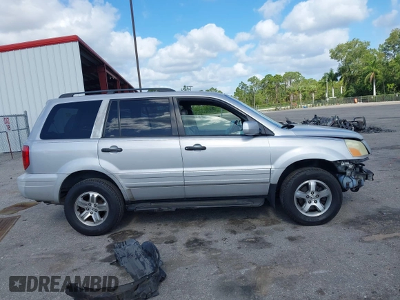 2003 Honda Pilot EX with VIN 2HKYF18603H504829, listed as a IAAI auction lot 42083247 with 247,429 mi miles and . Bid and sale history available at carsss.com. Image 13.