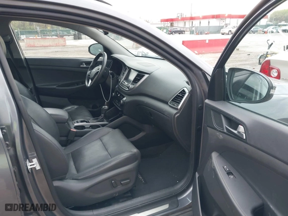 2016 Hyundai Tucson Limited with VIN KM8J3CA27GU088248, listed as a IAAI auction lot 42033882 with 102,112 mi miles. Bid and sale history available at carsss.com. Image 5.