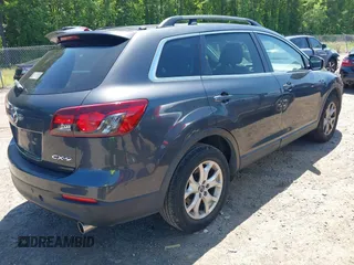 2014 Mazda CX-9 Touring with VIN JM3TB2CA0E0438247, listed as a IAAI auction lot 42190891 with 142,117 mi miles and . Bid and sale history available at carsss.com. Image 4.