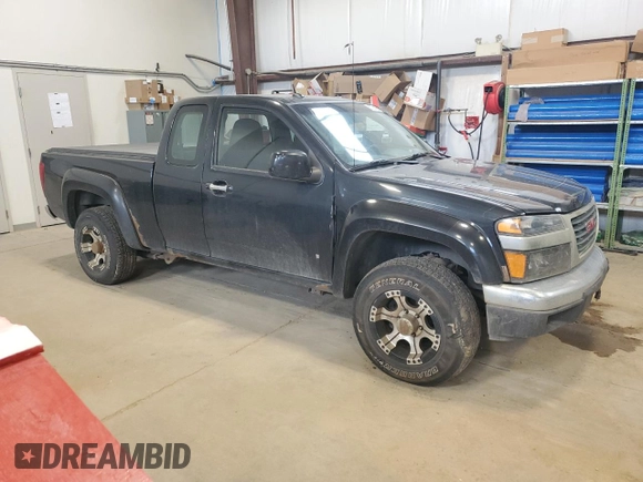2009 GMC Canyon Work Truck z VIN 1GTDT19E798132510, wystawiony jako Copart lot #57361995 z przebiegiem 240 338 mil mil oraz Czysty tytuł • Clean title. Historia ofert i sprzedaży dostępna na DreamBid. Obrazek 4.