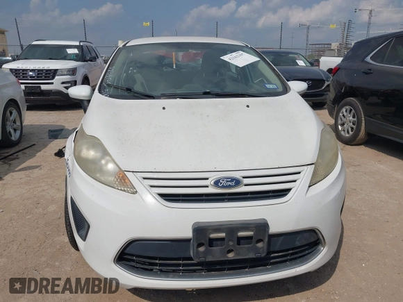 2011 Ford Fiesta S with VIN 3FADP4AJ1BM142682, listed as a IAAI auction lot 42162397 with 214,403 mi miles and . Bid and sale history available at DreamBid. Image 12.