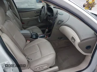2001 Oldsmobile Aurora z VIN 1G3GS64C114109142, wystawiony jako IAAI lot #41974652 z przebiegiem 81 395 mil mil oraz . Historia ofert i sprzedaży dostępna na DreamBid. Obrazek 5.