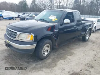 2000 Ford F-150 XL with VIN 1FTZX0725YKA09559, listed as a IAAI auction lot 41810954 with Not provided miles and . Bid and sale history available at DreamBid. Image 2.