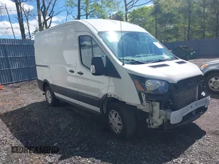 2020 Ford Transit Cargo z VIN 1FTBR1C8XLKA04894, wystawiony jako IAAI lot #42176726 z przebiegiem 84 154 mil mil oraz . Historia ofert i sprzedaży dostępna na DreamBid. Obrazek 1.
