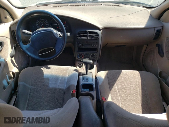2000 Saturn SL with VIN 1G8ZK5274YZ103237, listed as a Copart auction lot 60558105 with 126,320 mi miles and Salvage title. Bid and sale history available at DreamBid. Image 8.