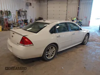 2015 Chevrolet Impala LTZ with VIN 2G1WC5E3XF1152424, listed as a IAAI auction lot 42222423 with 94,475 mi miles and . Bid and sale history available at DreamBid. Image 4.